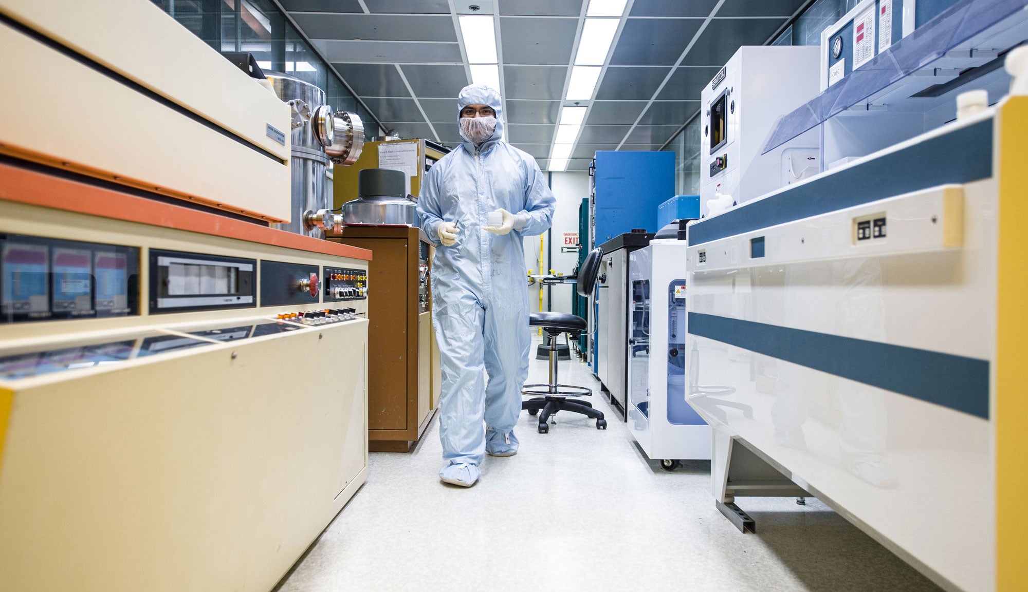 Researcher walks through the RPI cleanroom