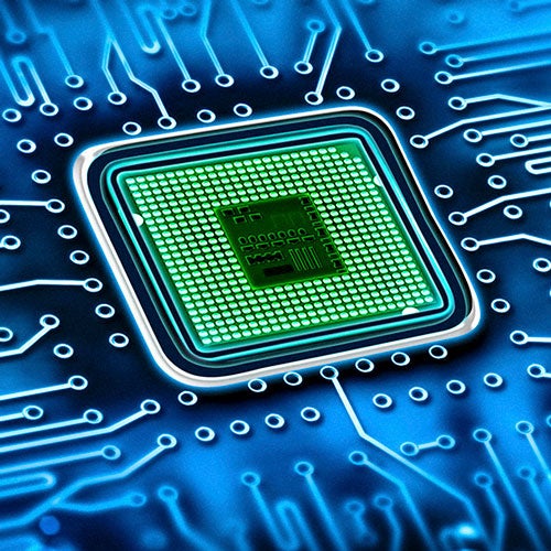 Green microchip set in a blue printed circuit board
